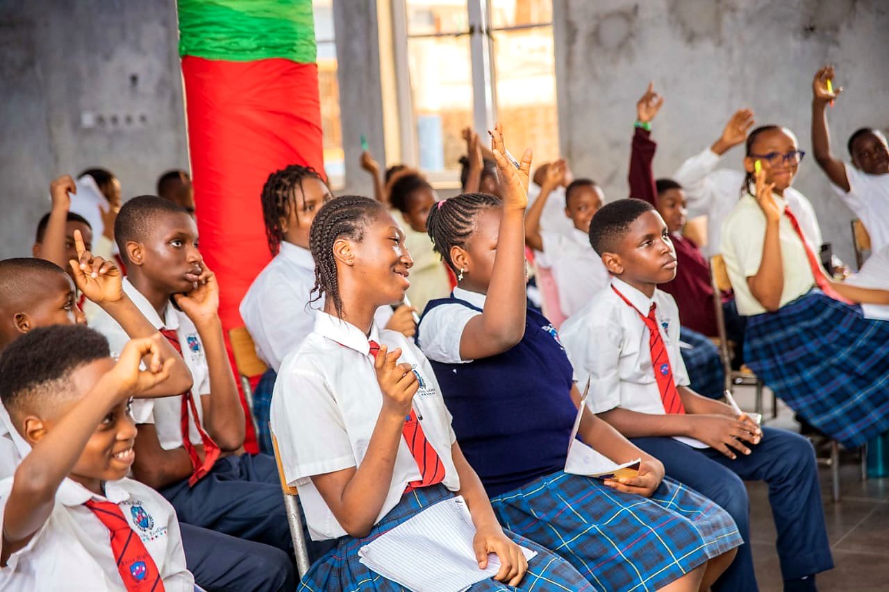 Students raising hands